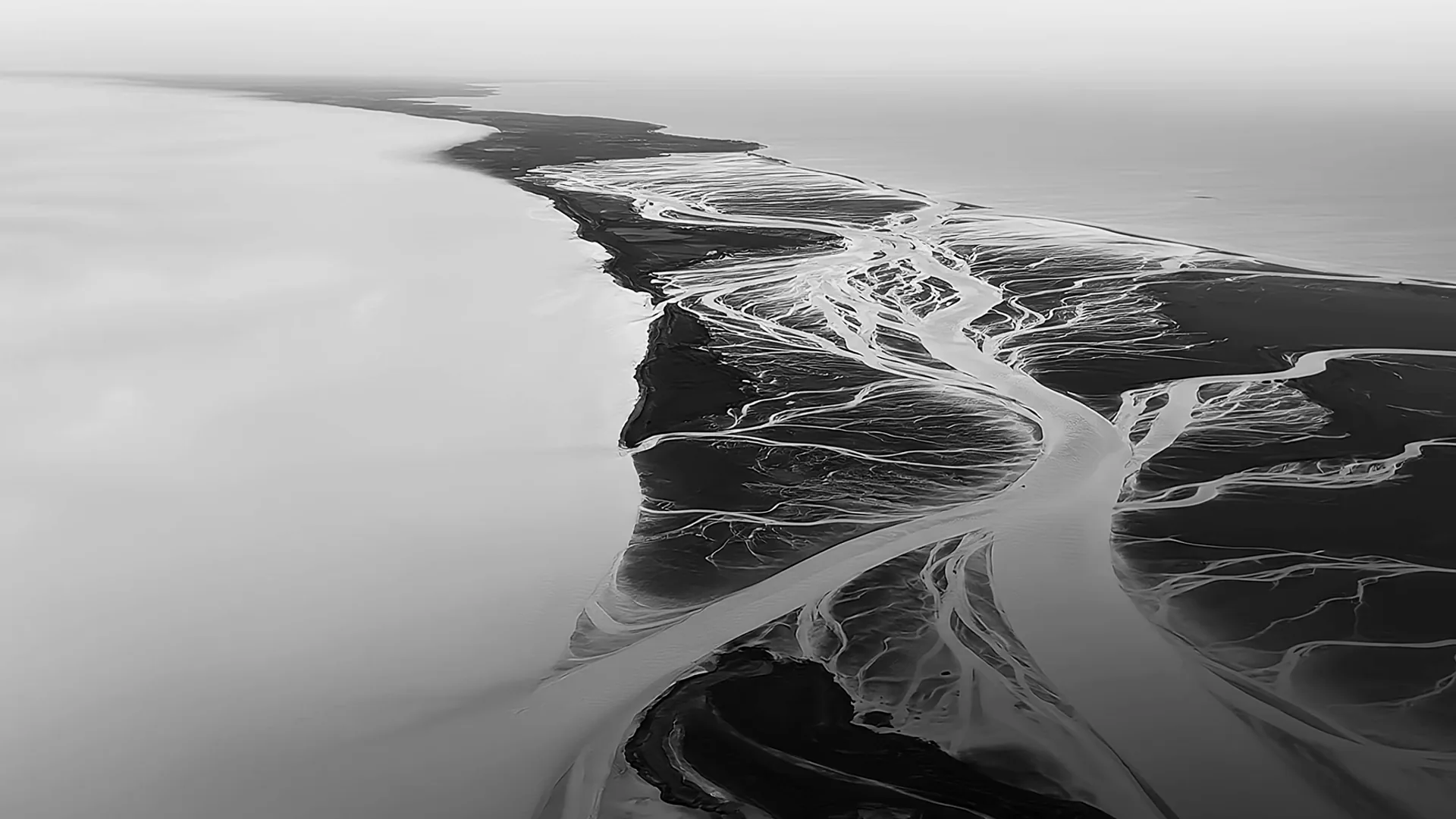 Aerial view of a tidal estuary.